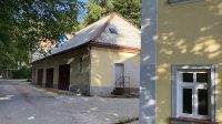 24. 9. 2025 - Garáže západně od lázeňského domu